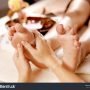 stock-photo-massage-of-human-foot-in-spa-salon-soft-focus-image-119142055